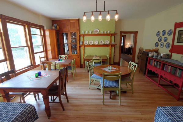 dining area with small tables and chairs